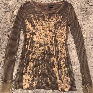 Daytrip thermal with gold flecks on the front.